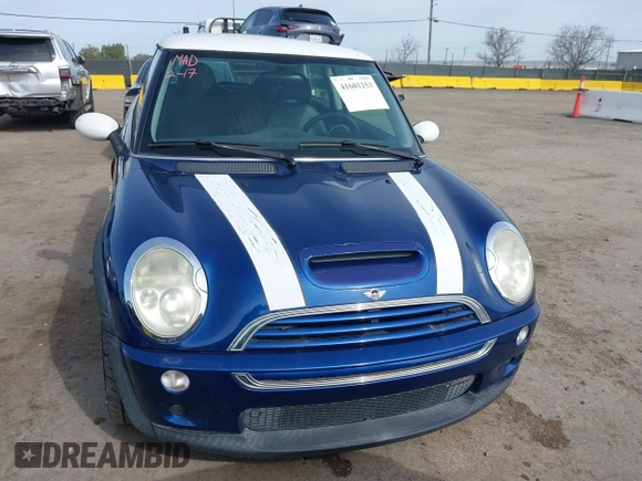 2003 MINI Hardtop S z VIN WMWRE33433TD72153, wystawiony jako IAAI lot #41601153 z przebiegiem 185 286 mil mil oraz . Historia ofert i sprzedaży dostępna na DreamBid. Obrazek 12.