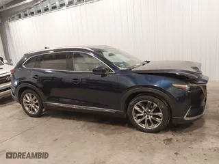 2016 Mazda CX-9 Grand Touring with VIN JM3TCBDY9G0109770, listed as a IAAI auction lot 41551085 with 131,812 mi miles. Bid and sale history available at carsss.com. Image 14.