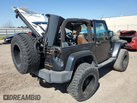 2012 Jeep Wrangler Sahara z VIN 1C4AJWBG1CL216425, wystawiony jako Copart lot #48377825 z przebiegiem 99 649 mil mil oraz Szkoda całkowita • Salvage title. Historia ofert i sprzedaży dostępna na DreamBid. Obrazek 3.