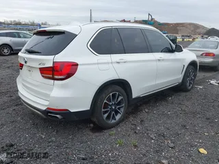 2018 BMW X5 xDrive35i with VIN 5UXKR0C58J0Y05234, listed as a IAAI auction lot 41957904 with 125,658 mi miles. Bid and sale history available at carsss.com. Image 4.
