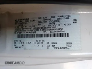 2008 Ford Econoline Passenger XL z VIN 1FBSS31L98DB42627, wystawiony jako Copart lot #63192154 z przebiegiem 111 494 mil mil oraz Szkoda całkowita • Salvage title. Historia ofert i sprzedaży dostępna na DreamBid. Obrazek 13.