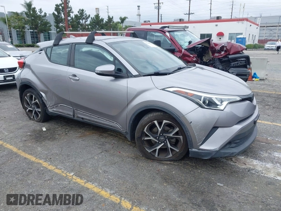 2018 Toyota C-HR XLE with VIN NMTKHMBX8JR032422, listed as a IAAI auction lot 42038240 with 132,553 mi miles and . Bid and sale history available at DreamBid. Image 1.