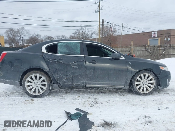 2012 Lincoln MKS with VIN 1LNHL9ER8CG806939, listed as a IAAI auction lot 41417607 with 147,808 mi miles. Bid and sale history available at carsss.com. Image 13.