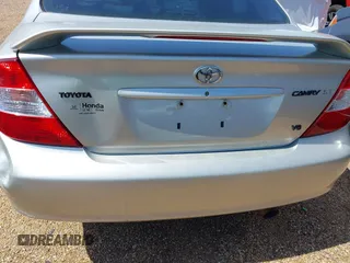 2003 Toyota Camry LE z VIN 4T1BF32K03U561492, wystawiony jako IAAI lot #41607321 z przebiegiem 171 920 mil mil oraz . Historia ofert i sprzedaży dostępna na DreamBid. Obrazek 19.