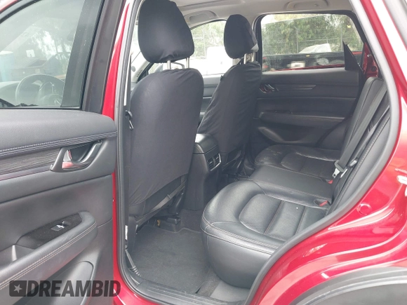 2018 Mazda CX-5 Grand Touring with VIN JM3KFADMXJ0302656, listed as a IAAI auction lot 42099173 with 125,378 mi miles and . Bid and sale history available at DreamBid. Image 8.