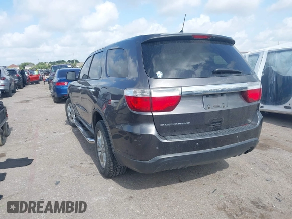 2013 Dodge Durango SXT with VIN 1C4RDHAG4DC686389, listed as a IAAI auction lot 42440260 with 166,952 mi miles and . Bid and sale history available at DreamBid. Image 3.