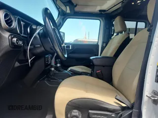 2020 Jeep Wrangler Unlimited Sahara with VIN 1C4HJXEN7LW165137, listed as a Copart auction lot 64458345 with 82,553 mi miles and Salvage title. Bid and sale history available at DreamBid. Image 7.