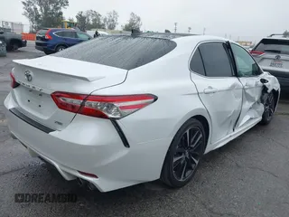 2018 Toyota Camry XSE with VIN 4T1BZ1HK8JU019394, listed as a IAAI auction lot 41492529 with 107,745 mi miles and . Bid and sale history available at DreamBid. Image 4.