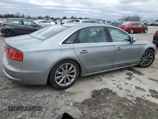 2011 Audi A8 with VIN WAURVAFD9BN006004, listed as a Copart auction lot 47996165 with 132,799 mi miles and Salvage title. Bid and sale history available at DreamBid. Image 3.