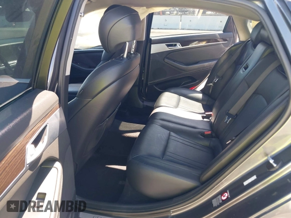 2018 Genesis G80 3.8L z VIN KMHGN4JEXJU283935, wystawiony jako IAAI lot #41750441 z przebiegiem 70 165 mil mil oraz . Historia ofert i sprzedaży dostępna na DreamBid. Obrazek 8.