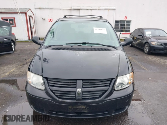 2007 Dodge Caravan SXT with VIN 1D4GP45R87B161237, listed as a IAAI auction lot 41594127 with 154,508 mi miles and . Bid and sale history available at DreamBid. Image 12.