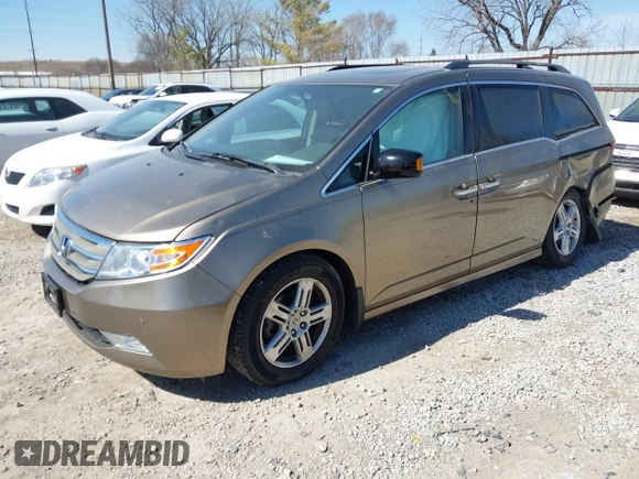 2012 Honda Odyssey Touring with VIN 5FNRL5H9XCB110672, listed as a IAAI auction lot 41826895 with 159,927 mi miles. Bid and sale history available at carsss.com. Image 2.