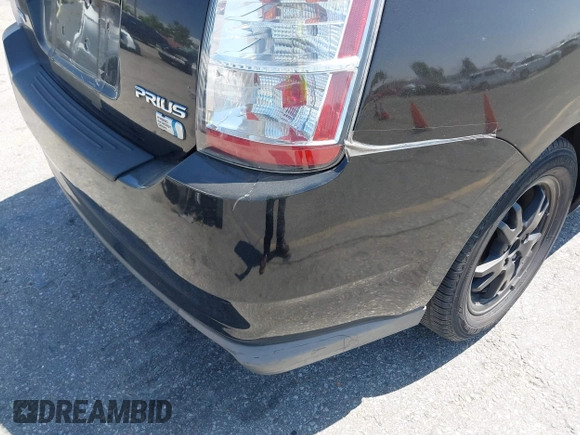 2007 Toyota Prius with VIN JTDKB20U177665184, listed as a IAAI auction lot 42673560 with 209,925 mi miles and . Bid and sale history available at DreamBid. Image 6.