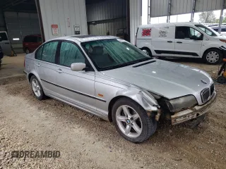 2000 BMW 3 Series 323i with VIN WBAAM3348YFP73443, listed as a Copart auction lot 54165575 with 334,761 mi miles and Salvage title. Bid and sale history available at DreamBid. Image 4.