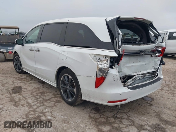 2022 Honda Odyssey Elite z VIN 5FNRL6H96NB039950, wystawiony jako IAAI lot #41907106 z przebiegiem 67 490 mil mil oraz . Historia ofert i sprzedaży dostępna na DreamBid. Obrazek 3.