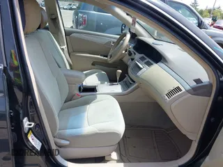 2007 Toyota Avalon XL z VIN 4T1BK36B37U244981, wystawiony jako IAAI lot #42202155 z przebiegiem 187 656 mil mil oraz . Historia ofert i sprzedaży dostępna na DreamBid. Obrazek 5.