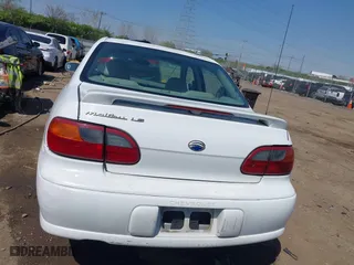 2003 Chevrolet Malibu LS with VIN 1G1NE52J13M538299, listed as a IAAI auction lot 42051511 with 213,853 mi miles. Bid and sale history available at carsss.com. Image 16.