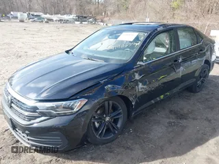 2023 Volkswagen Jetta SE z VIN 3VW7M7BU1PM039129, wystawiony jako IAAI lot #41905547 z przebiegiem 20 188 mil mil oraz . Historia ofert i sprzedaży dostępna na DreamBid. Obrazek 18.