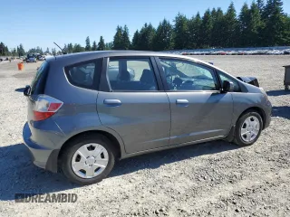 2013 Honda Fit с VIN JHMGE8H34DC069516, выставлен на аукционе Copart как лот 59993335 с пробегом 128 798 миль миль и Списание • Salvage title. История ставок и продаж доступна на DreamBid. Изображение 3.