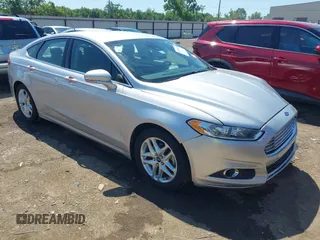 2013 Ford Fusion SE z VIN 3FA6P0HR2DR163219, wystawiony jako IAAI lot #42255313 z przebiegiem 86 631 mil mil oraz . Historia ofert i sprzedaży dostępna na DreamBid. Obrazek 1.