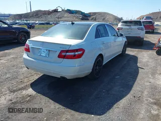 2012 Mercedes-Benz E-Class E 350 Luxury with VIN WDDHF8JB4CA651569, listed as a IAAI auction lot 41769849 with 150,074 mi miles. Bid and sale history available at carsss.com. Image 4.