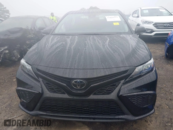 2023 Toyota Camry SE z VIN 4T1G11AK0PU809322, wystawiony jako IAAI lot #41056512 z przebiegiem 33 159 mil mil oraz . Historia ofert i sprzedaży dostępna na DreamBid. Obrazek 12.