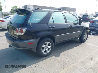 2001 Lexus RX 300 z VIN JTJHF10UX10181150, wystawiony jako IAAI lot #42474131 z przebiegiem 143 047 mil mil oraz . Historia ofert i sprzedaży dostępna na DreamBid. Obrazek 4.