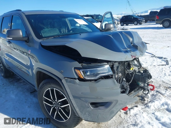 2021 Jeep Grand Cherokee Trailhawk with VIN 1C4RJFLG2MC854007, listed as a IAAI auction lot 41512394 with 50,674 mi miles. Bid and sale history available at carsss.com. Image 18.