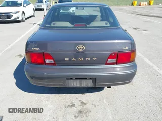 1996 Toyota Camry DX with VIN 4T1BG12K8TU915891, listed as a IAAI auction lot 41874731 with 57,564 mi miles. Bid and sale history available at carsss.com. Image 14.