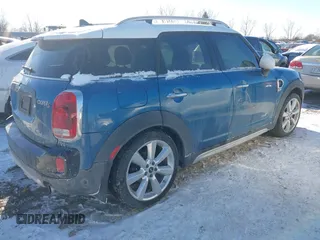 2018 MINI Countryman Cooper S with VIN WMZYT5C3XJ3E61612, listed as a IAAI auction lot 41276107 with 59,554 mi miles and . Bid and sale history available at DreamBid. Image 4.