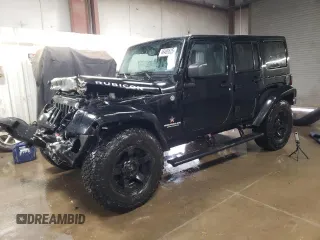 2015 Jeep Wrangler Unlimited Rubicon Hard Rock with VIN 1C4HJWFG4FL676868, listed as a Copart auction lot 48489525 with 100,771 mi miles and Salvage title. Bid and sale history available at DreamBid. Image 1.