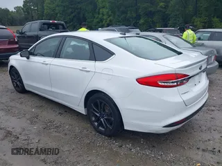2018 Ford Fusion SE with VIN 3FA6P0HD6JR153230, listed as a IAAI auction lot 40336904 with 71,949 mi miles and . Bid and sale history available at DreamBid. Image 3.