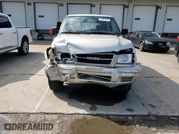 1999 Isuzu Trooper S with VIN JACDJ58X6X7924973, listed as a Copart auction lot 57881235 with 269,301 mi miles and Salvage title. Bid and sale history available at DreamBid. Image 13.