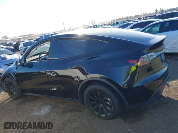 2023 Tesla Model Y Long Range with VIN 7SAYGDEE0PF907260, listed as a IAAI auction lot 41180227 with Not Provided miles and . Bid and sale history available at DreamBid. Image 14.