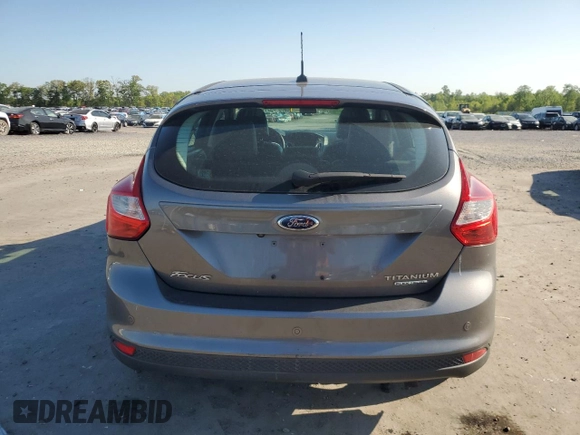 2014 Ford Focus Titanium with VIN 1FADP3N24EL269008, listed as a Copart auction lot 56396975 with 116,856 mi miles and Salvage title. Bid and sale history available at DreamBid. Image 6.