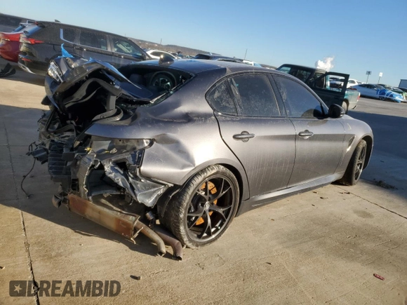 2021 Alfa Romeo Giulia Quadrifoglio with VIN ZARFAMEV2M7646078, listed as a Copart auction lot 82237543 with Not provided miles and . Bid and sale history available at DreamBid. Image 3.
