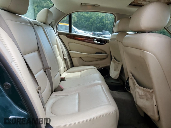 2004 Jaguar XJ with VIN SAJWA71C34SG16508, listed as a Copart auction lot 66751644 with 179,039 mi miles and Salvage Title. Bid and sale history available at carsss.com. Image 10.