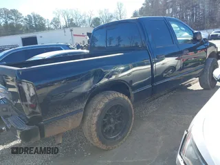 2004 Dodge 1500 SLT with VIN 1D7HA18D64S753335, listed as a IAAI auction lot 41572106 with 135,891 mi miles. Bid and sale history available at carsss.com. Image 4.