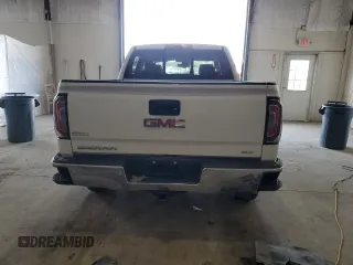 2018 GMC Sierra 1500 SLT z VIN 3GTU2NEC3JG279324, wystawiony jako Copart lot #52692245 z przebiegiem 112 974 mil mil oraz Szkoda całkowita • Salvage title. Historia ofert i sprzedaży dostępna na DreamBid. Obrazek 6.
