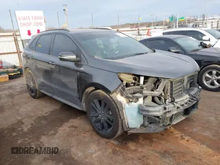 2020 Ford Edge SEL z VIN 2FMPK3J93LBB53641, wystawiony jako IAAI lot #41340813 z przebiegiem 87 417 mil mil oraz . Historia ofert i sprzedaży dostępna na DreamBid. Obrazek 1.