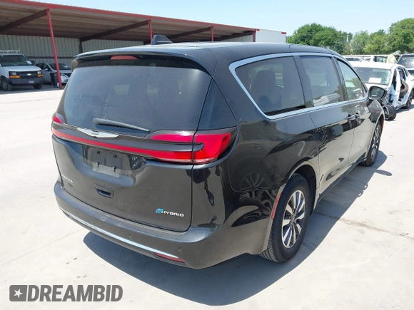2023 Chrysler Pacifica Hybrid Touring L z VIN 2C4RC1L77PR540958, wystawiony jako IAAI lot #42010484 z przebiegiem 61 166 mil mil oraz . Historia ofert i sprzedaży dostępna na DreamBid. Obrazek 4.