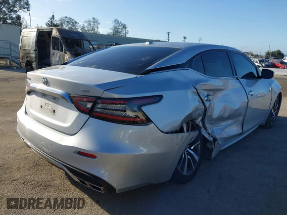 2021 Nissan Maxima SV with VIN 1N4AA6CV7MC512294, listed as a IAAI auction lot 42243607 with 87,803 mi miles and . Bid and sale history available at DreamBid. Image 4.
