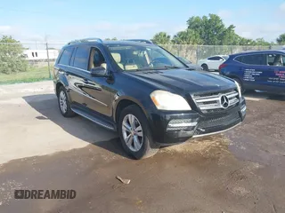 2012 Mercedes-Benz GL 450 z VIN 4JGBF7BE5CA763084, wystawiony jako IAAI lot #42324205 z przebiegiem 166 570 mil mil oraz . Historia ofert i sprzedaży dostępna na DreamBid. Obrazek 1.
