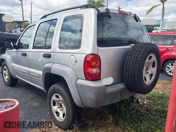 2002 Jeep Liberty Sport with VIN 1J4GL48K72W243074, listed as a Copart auction lot 47081875 with 127,178 mi miles and Clean Title. Bid and sale history available at carsss.com. Image 3.