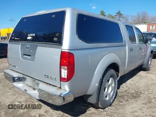 2007 Nissan Frontier SE with VIN 1N6AD09W97C423696, listed as a IAAI auction lot 42010577 with 117,096 mi miles. Bid and sale history available at carsss.com. Image 4.