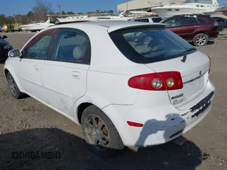 2005 Suzuki Reno z VIN KL5JJ66Z95K107110, wystawiony jako IAAI lot #41804157 z przebiegiem Nie podano mil oraz . Historia ofert i sprzedaży dostępna na DreamBid. Obrazek 3.