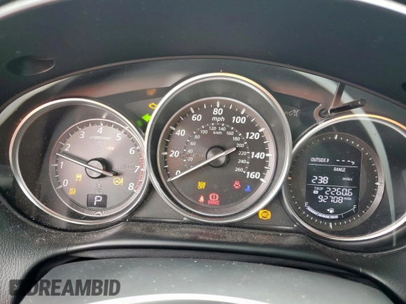 2014 Mazda CX-5 Touring z VIN JM3KE2CY7E0308580, wystawiony jako Copart lot #60565835 z przebiegiem 92 708 mil mil oraz Szkoda całkowita • Salvage title. Historia ofert i sprzedaży dostępna na DreamBid. Obrazek 9.