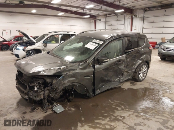 2017 Ford Escape Titanium with VIN 1FMCU9JD7HUE46427, listed as a IAAI auction lot 41808083 with 55,201 mi miles. Bid and sale history available at carsss.com. Image 2.