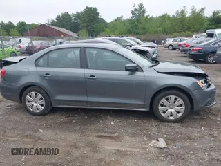 2014 Volkswagen Jetta SE with VIN 3VWD07AJ7EM239807, listed as a IAAI auction lot 42457159 with 72,637 mi miles and . Bid and sale history available at DreamBid. Image 14.