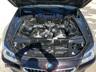2014 BMW M6 z VIN WBS6C9C51EDV73883, wystawiony jako Copart lot #76395574 z przebiegiem 57 995 mil mil oraz Czysty tytuł • Clean title. Historia ofert i sprzedaży dostępna na DreamBid. Obrazek 11.